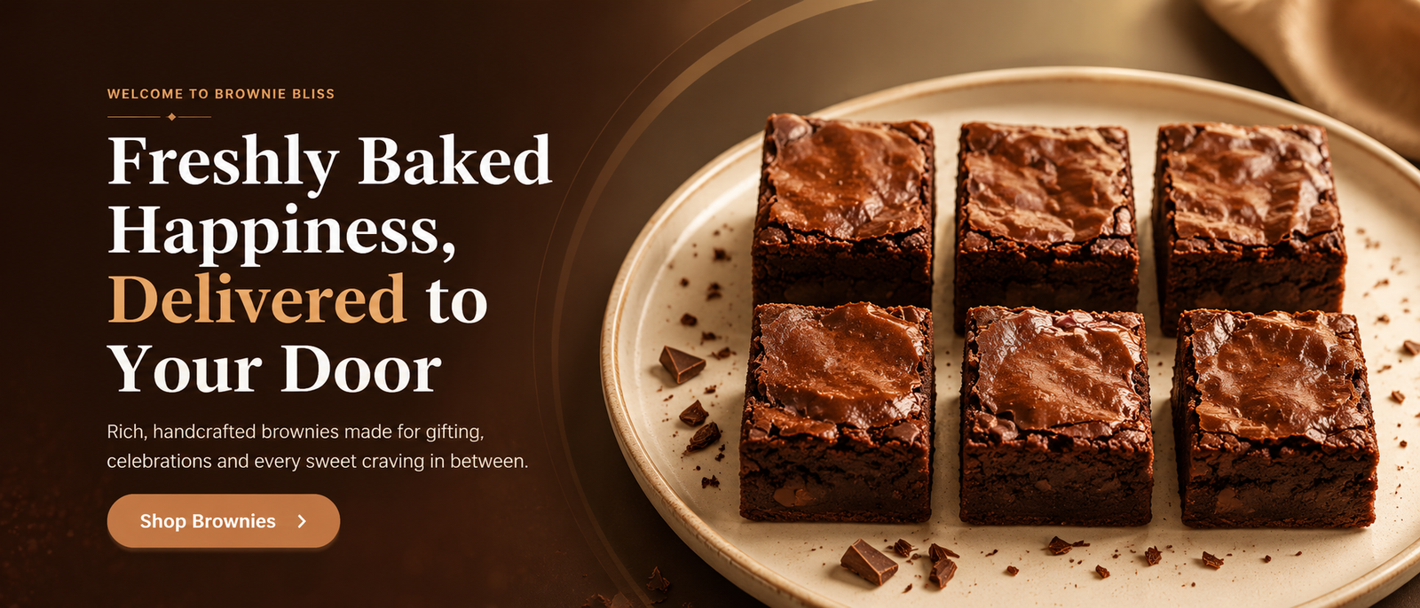 Freshly baked fudgy brownies arranged on a ceramic plate beside the Brownie Bliss welcome message.
